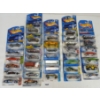 Image 1 : LOT OF 35 - HOT WHEELS DIECAST VEHICLES - INCL FERRARI & ANGLIA, ETC.