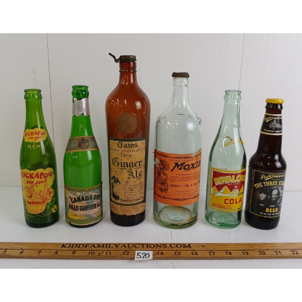 LOT OF 6 - SODA & BEER BOTTLES - INCL KICKAPOO JOY JUICE, DAW'S DRY GINGER ALE, THREE STOOGES, ETC