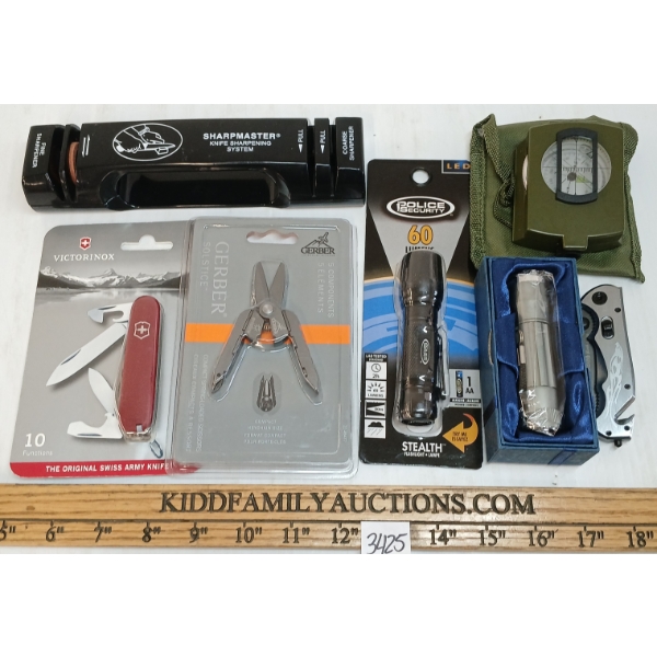 LOT OF 7 - LENSATIC COMPASS, KNIFE SHARPENER, FOLDING TOOLS & FLASHLIGHTS