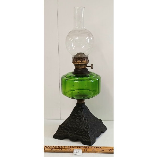 GREEN GLASS OIL LAMP W/ CAST IRON BASE - C. EARLY / MID 20TH CENTURY