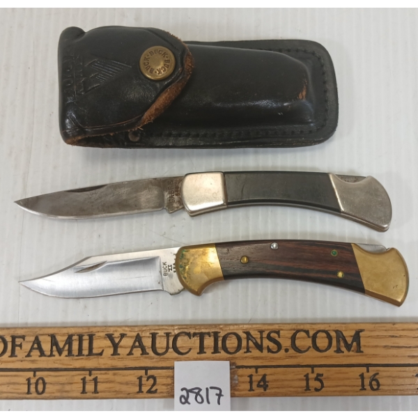 LOT OF 2 - FOLDING KNIVES - INCL SABRE & BUCK