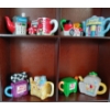 Image 3 : QTY OF RED ROSE TEAPOT FIGURINES W/ DISPLAY CASE
