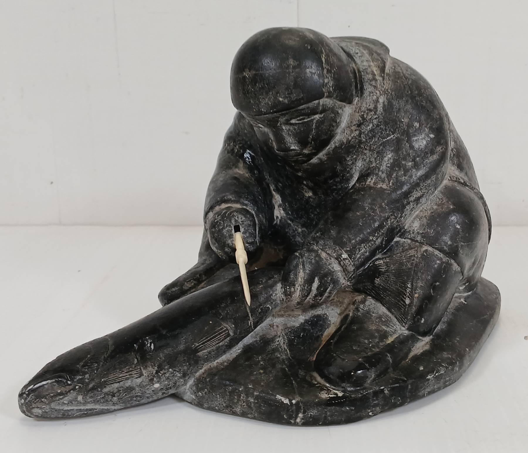 INUK SKINNING FISH BY PILUPUSI PUTUGU (1918- ?) - STONE & BONE - Kidd ...