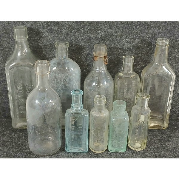 LOT OF 10 - EMBOSSED APOTHECARY BOTTLES - INCL CALIFORNIA FIC SYRUP CO., ETC 