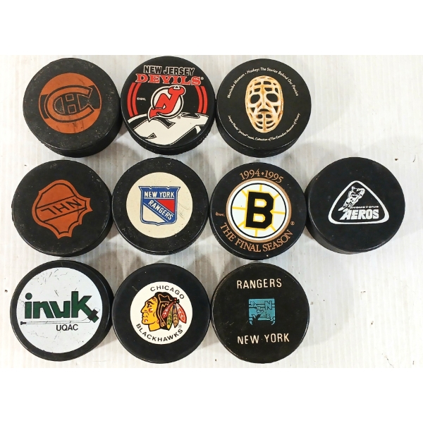 LOT OF 10 - HOCKEY PUCKS - BLACK HAWKS, RANGERS, CANADIENS, ETC