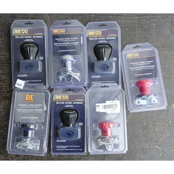 LOT OF 7 - BE UNIVERSAL & DELUXE WHEEL SPINNERS