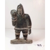 Image 2 : HUNTER CARRYING SEAL TAIL - SIGNED - STONE