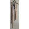 Image 1 : LOT OF 4 - BRONZE POMMEL WOOD CARVED CANES - INCL DUCK & HATCHET