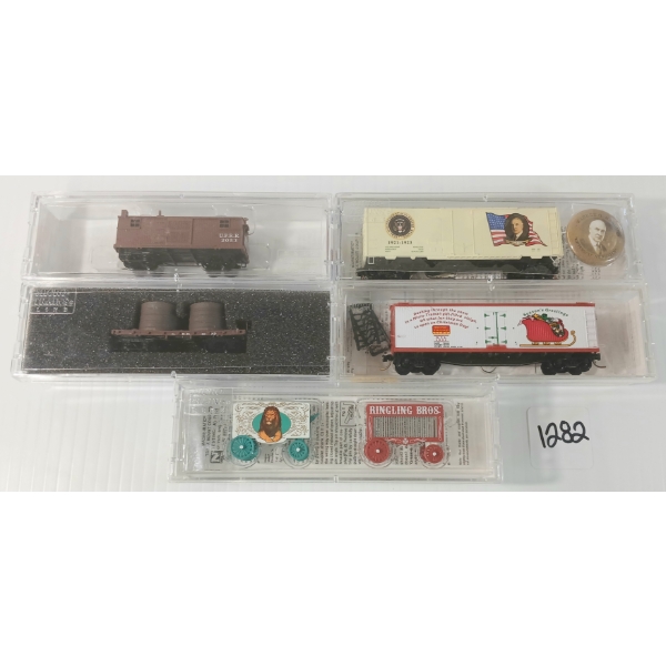 LOT OF 5 - MICRO TRAINS - CHRISTMAS, CIRCUS, PRESIDENTIAL & UNION PACIFIC CAR SERIES