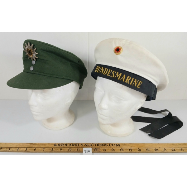 LOT OF 2 - EAST GERMAN & UKRAINIAN ARMY / NAVAL OFFICER'S CAPS