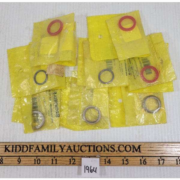 LOT OF 8 - REMINGTON PISTONS & SEALS