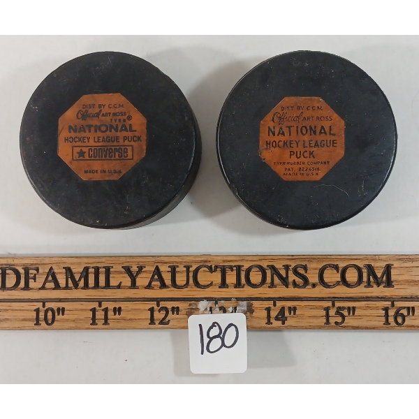 LOT OF 2 - 1969-1977 ART ROSS HOCKEY GAME PUCKS