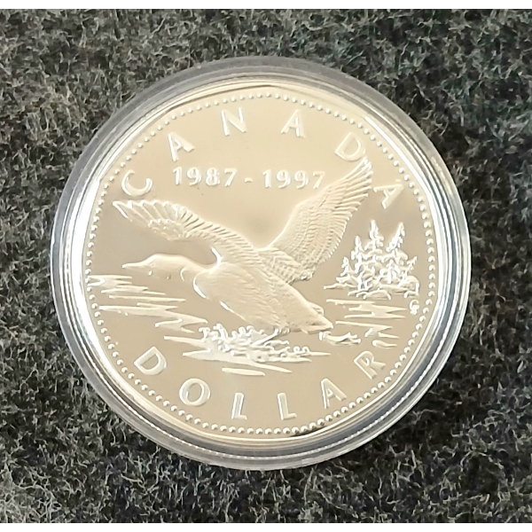 1997 RCM 10TH ANNIVERSARY SILVER PROOF DOLLAR