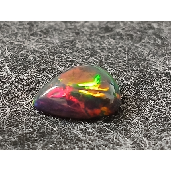 PEAR CABOCHON CUT LOOSE NATURAL WELO BLACK OPAL ($10,530.00 APPRAISAL)