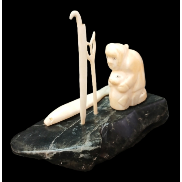 SEAL HUNTER BY ISA AQIATTUSUK SMILER (1921 - 1986) - ANTLER & STONE