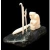 Image 1 : SEAL HUNTER BY ISA AQIATTUSUK SMILER (1921 - 1986) - ANTLER & STONE
