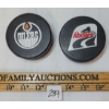 Image 1 : LOT OF 2 - WHA OILERS & RACERS HOCKEY PUCKS