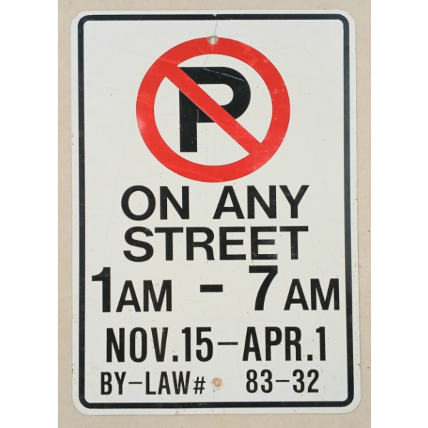 NO PARKING ON ANY STREET - SINGLE SIDED METAL SIGN
