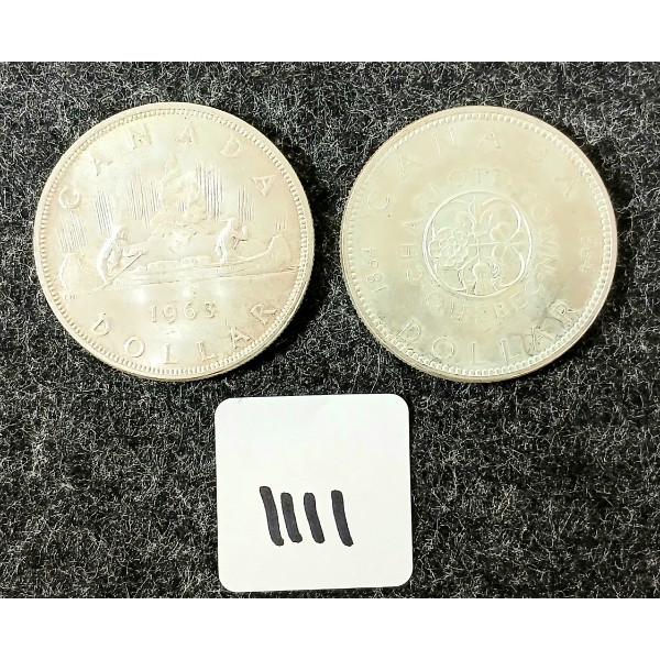 LOT OF 2 - 1963 & 1964 CDN SILVER DOLLARS - CHARLOTTETOWN & VOYAGEUR