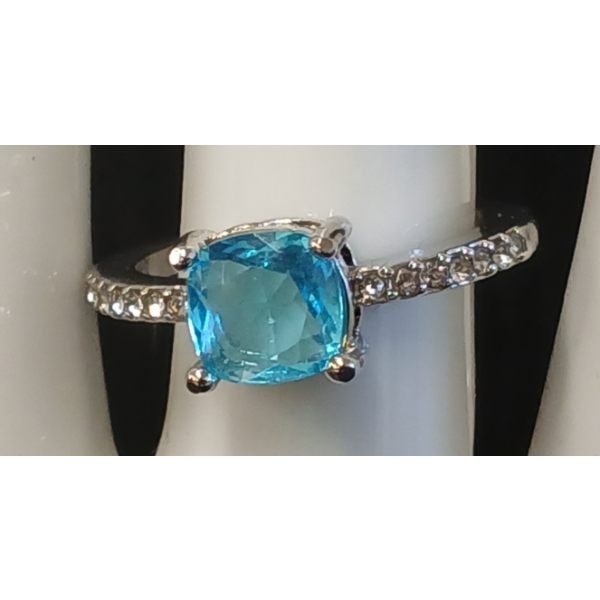 PLATINUM PLATED BLUE CUSHION CUT SIMULATED DIAMOND (CZ) CHANEL RING