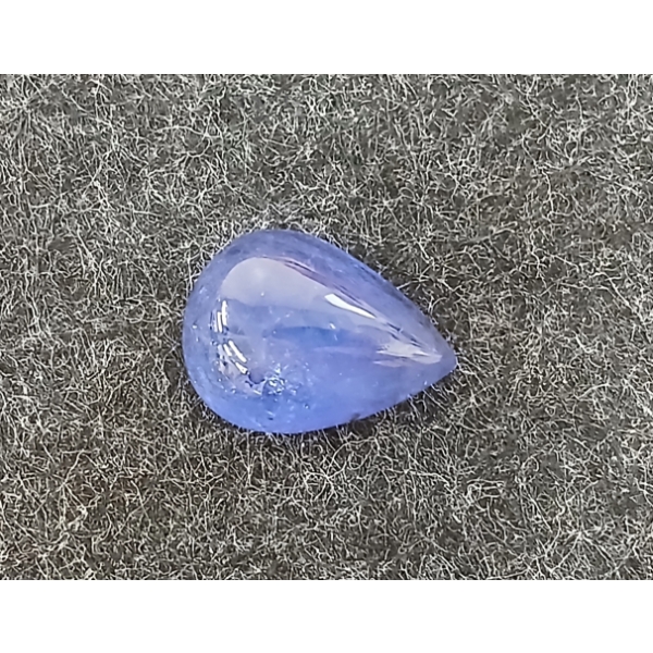 PEAR CABOCHON CUT NATURAL STRONG VIOLETISH BLUE TANZANITE ($11,680 APPRAISAL)