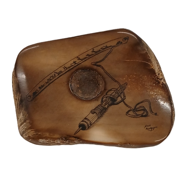CARVED SCRIMSHAW STONE BY ALVIN ANINGAYOG (PRS SIBERIAN ARTIST)
