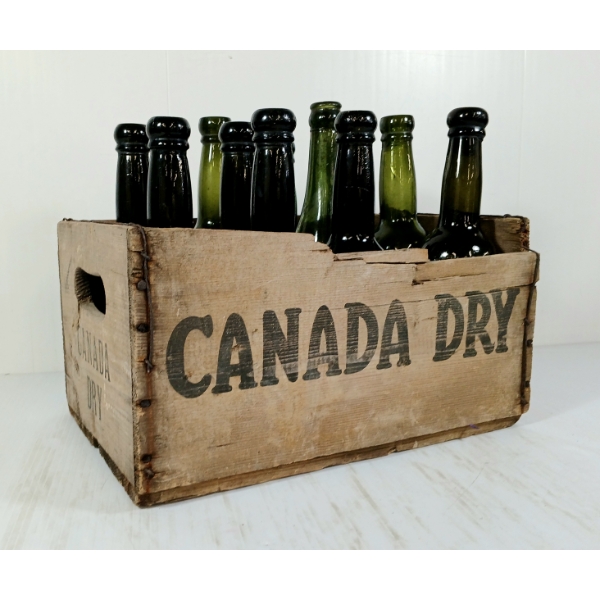 LOT OF 12 - BELFAST MINERAL WATER CO. GREEN EMBOSSED BOTTLES & CANADA DRY CRATE