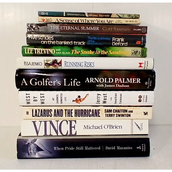 LOT OF 11 - ASSORTED SPORTS BOOKS - BASKETBALL, ROLLER DERBIE, NEWS REPORTING, ETC