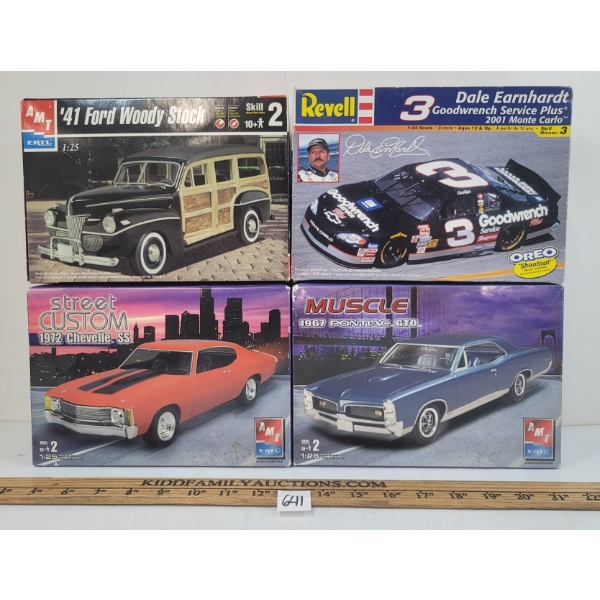 LOT OF 4 - AMT & REVELL MODEL KITS - 1967 PONTIAC, 1972 CHEVELLE, 1941 WOODY STOCK, ETC