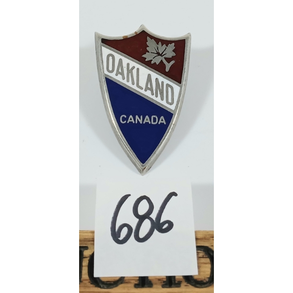 1929 OAKLAND CANADA RAD BADGE