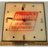 Image 1 : UNIVERSAL MILKING EQUIPMENT LIGHT UP WALL CLOCK