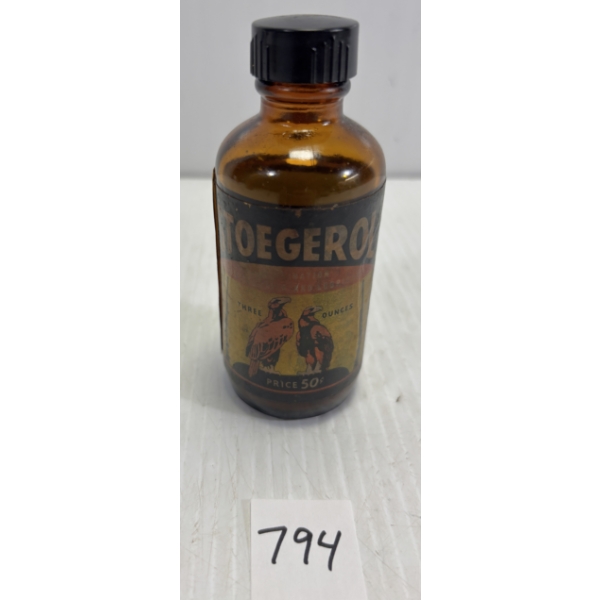 STOEGEROL 3 OZ COLLECTIBLE BOTTLE W/ PAPER LABEL & CONTENTS