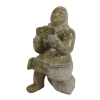 WOMAN READING BY EYESIAK - STONE