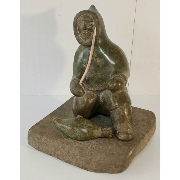 "MAN WITH SEAL" BY UNKNOWN ARTIST - STONE & BONE