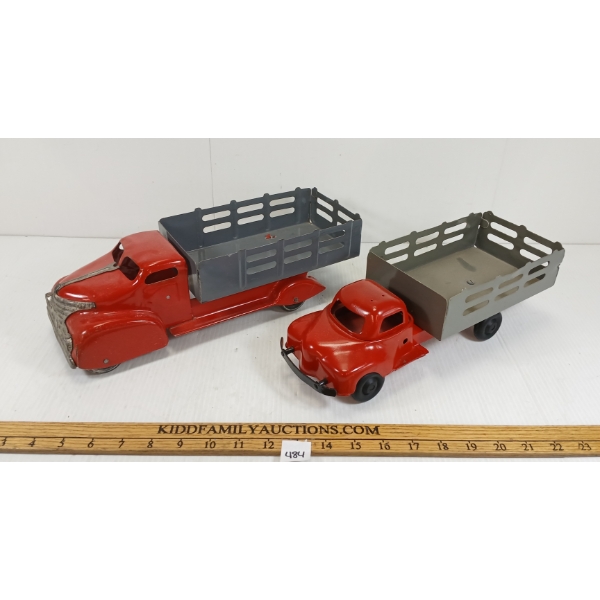 LOT OF 2 - PRESSED STEEL STAKE TRUCKS