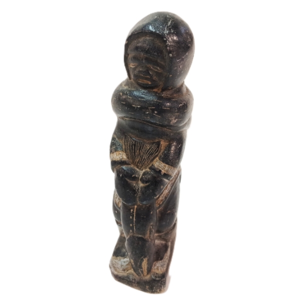 WOMAN PULLING ARCTIC CHAR - SIGNED - STONE