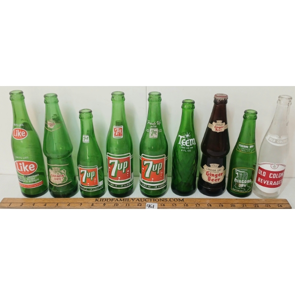 LOT OF 9 - 7UP, CANADA DRY, DIETS LIKE, NIAGRA DRY, GINGER BEER, TEEM & OLD COLONEY POP BOTTLES