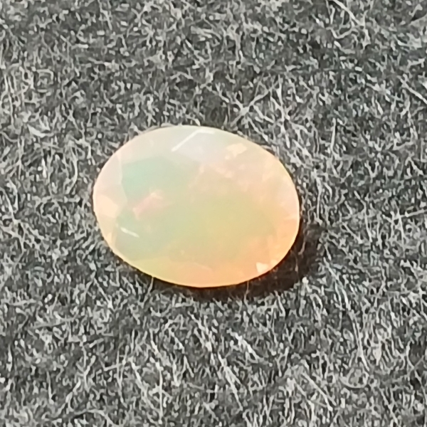 NATURAL SIGNATURE BRIGHT FLASH OPAL - FACETED OVAL CUT