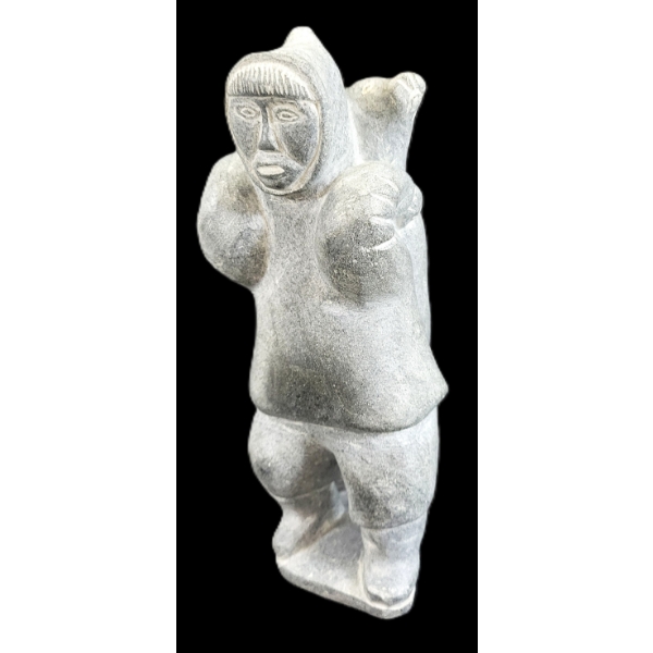 HUNTER CARRYING SEAL BY PINGU ALAKU (1930 - 1975) - STONE