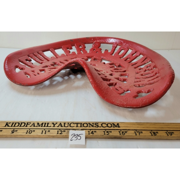FULLER & JOHNSON CAST IMPLEMENT SEAT