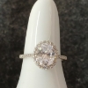 Image 1 : STERLING SILVER & SIMULATED DIAMOND HALO RING - OVAL CUT