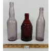 Image 2 : LOT OF 3 - AMETHYST EMBOSSED BOTTLES - INCL E.C. ANDRICH & BRO., ETC.