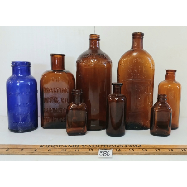 LOT OF 8 - AMBER & COBALT EMBOSSED APOTHECARY BOTTLES - BROMO-SELTZER, WARNER'S SAFE CURE, ETC