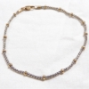 Image 1 : 10K Yellow & White Gold Beaded Bracelet with Lobster Clasp. Total weight of 2.58 grams.
