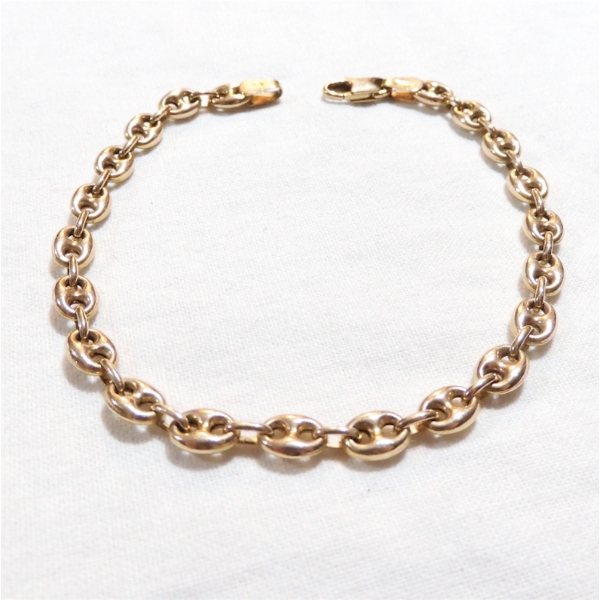 Lady's 10K Yellow Gold Gucci-link Bracelet. 7 1/4" Length & 4.57 grams.