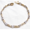 Image 1 : Lady's 14K Yellow & White Gold Channel Set Diamond Bracelet. 7" Length w/ Safety Catch. 9.1 grams. 