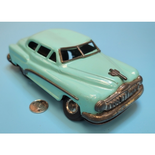 Tin Toy Pontiac Sedan Car Made in Japan Friction Motor