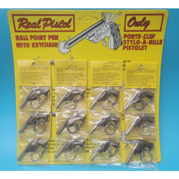 KEYRING STORE DISPLAY GUNS IN HOLSTERS