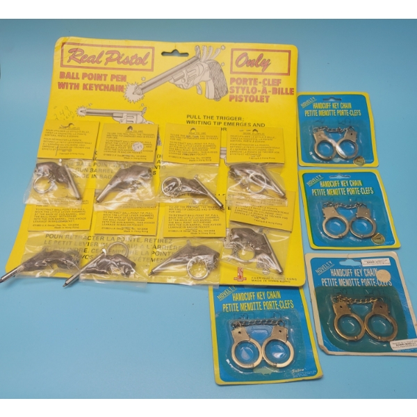 KEYRING STORE DISPLAY GUNS IN HOLSTERS AND HAND CUFFS