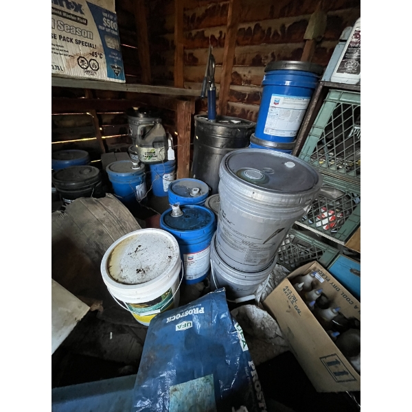 Pails of Oil & Coolant & Jugs in Shed
